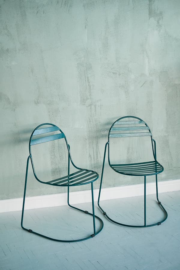 two metal chairs