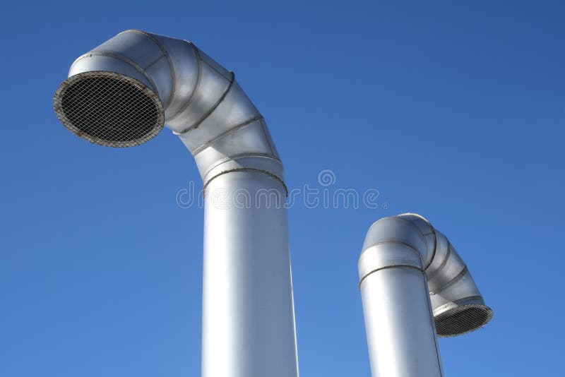 Two metallic industrial pipes