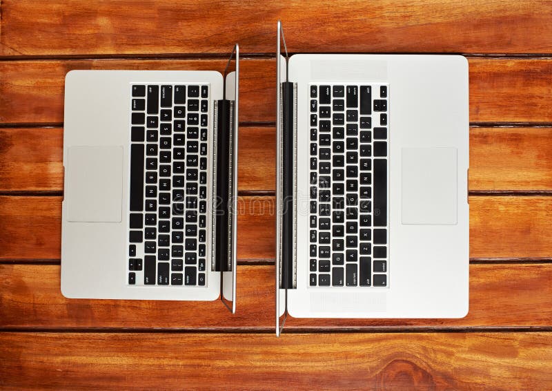 Two Modern Laptops on Wooden Table Stock Image Image of table