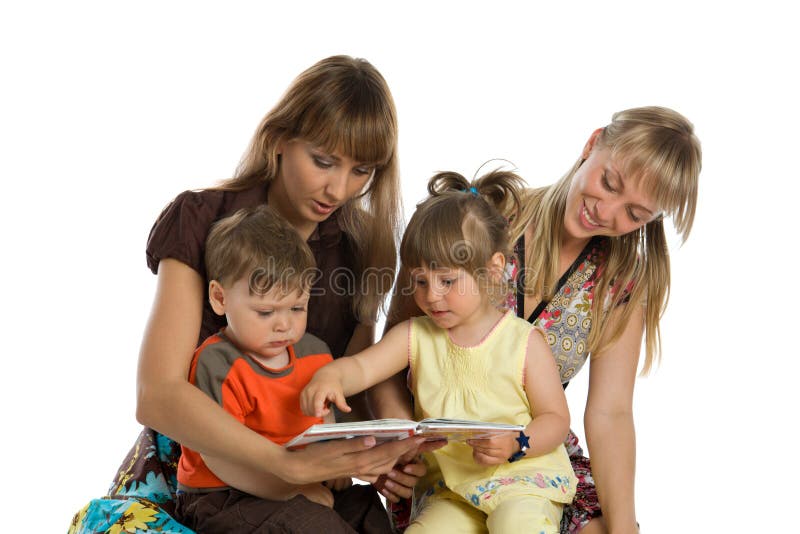 Two mothers read books to their children