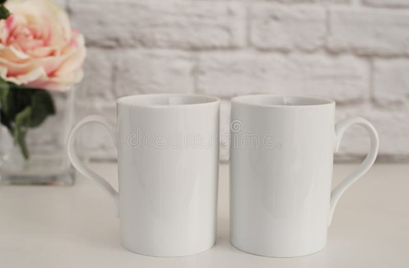 Two Mugs. White Mugs Mockup. Blank White Coffee Mug Mock up. Styled Photography. Coffee Cup Product Display stock photography Two Mugs. White Mugs Mockup. Blank White Coffee Mug Mock up. Styled Photography. Coffee Cup Product Display stock photography
