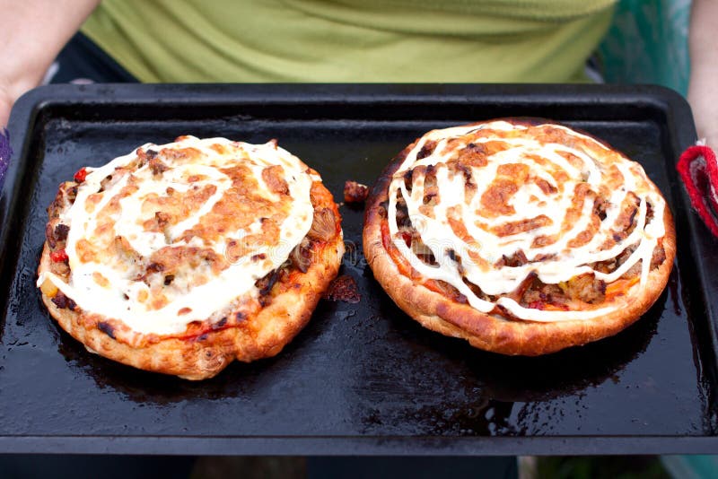 Two mushroom pizzas