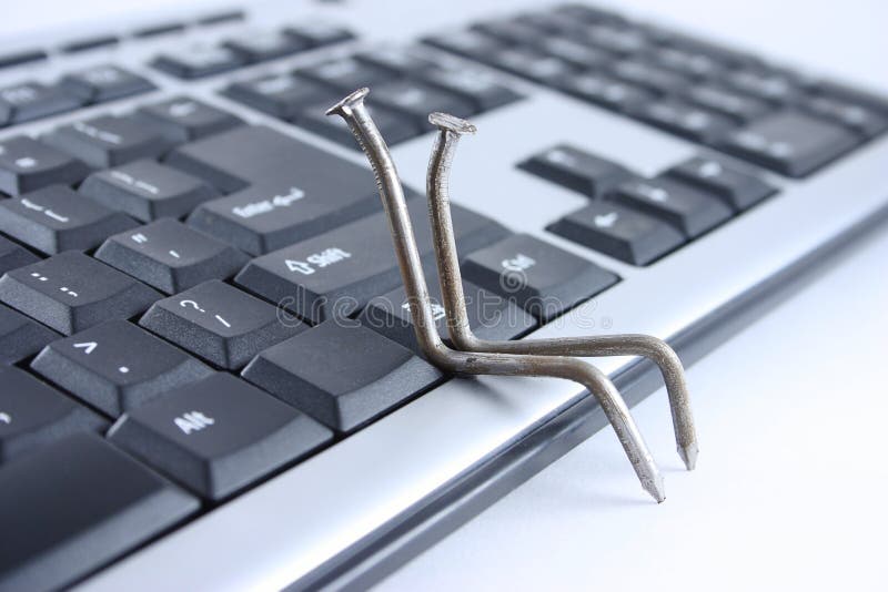 Two nails sitting on the keyboard