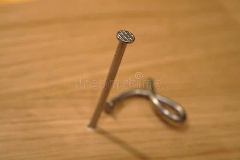 Two Nails on Wooden Background Stock Photo - Image of wood, stuff: 4349144