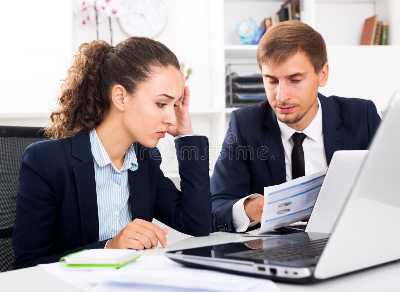 Two Office Workers Who Are Too Poisonous For One's Eyes Two Office Workers Made a Mistake Stock Image - Image of management