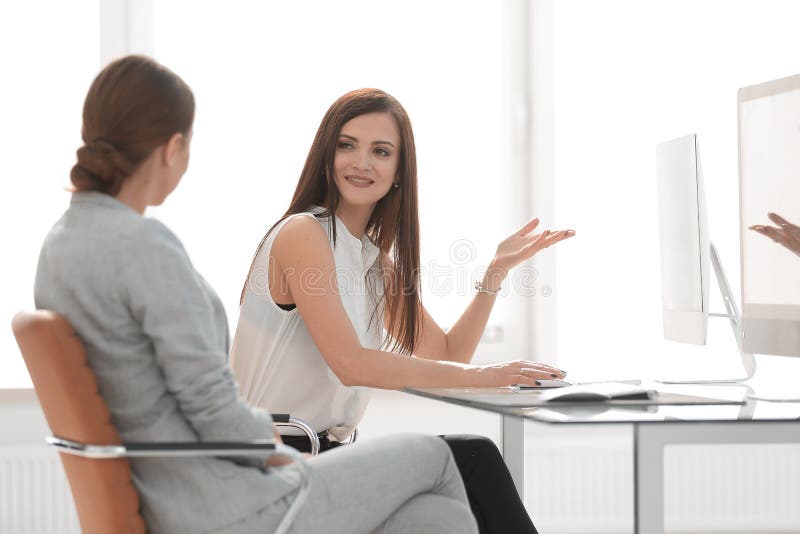 Two Office Workers Who Are Too Poisonous For One's Eyes Two Office Workers Talking in the Workplace Stock Image - Image of