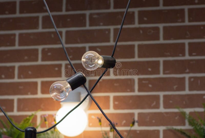 Two Old Bulb Hanging from the Ceiling Closeup Stock Image Image of