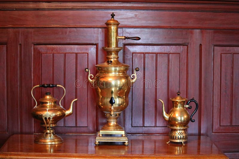 https://thumbs.dreamstime.com/b/two-old-copper-teapots-samovar-durbes-manor-outskirts-latvian-city-tukums-may-two-old-copper-167517028.jpg