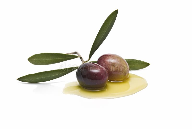 Two olives on olive oil royalty free stock image Two olives on olive oil royalty free stock image