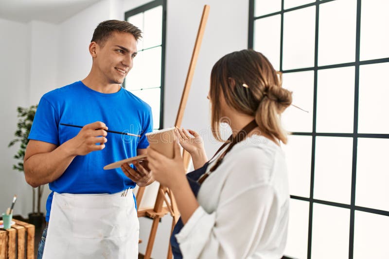Two Paint Students Smiling Happy Talking and Drinking Coffee at Art