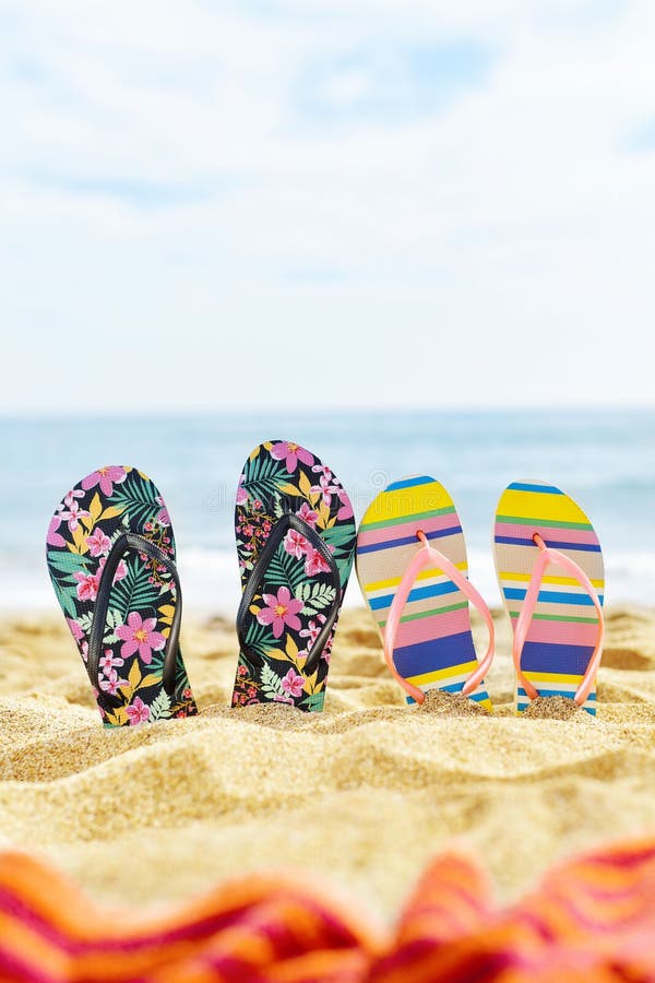 colorful flip flops on the beach