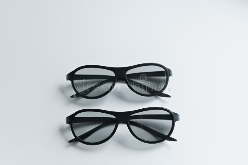 Two pairs of 3d glasses for cinema. Watching movie in 3d. Black glasses. royalty free stock images Two pairs of 3d glasses for cinema. Watching movie in 3d. Black glasses. royalty free stock images