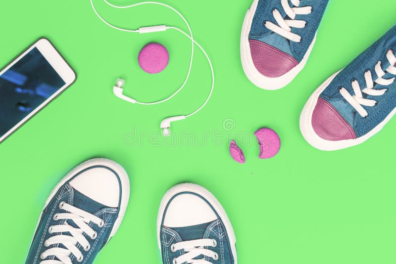 A Pair of Sneakers with Mobile Headphones Stock Photo - Image of pair ...