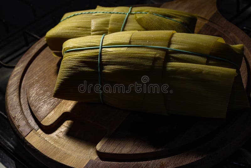 Two Pamonhas Wrapped in Corn Husks. Stock Image Image of dishes