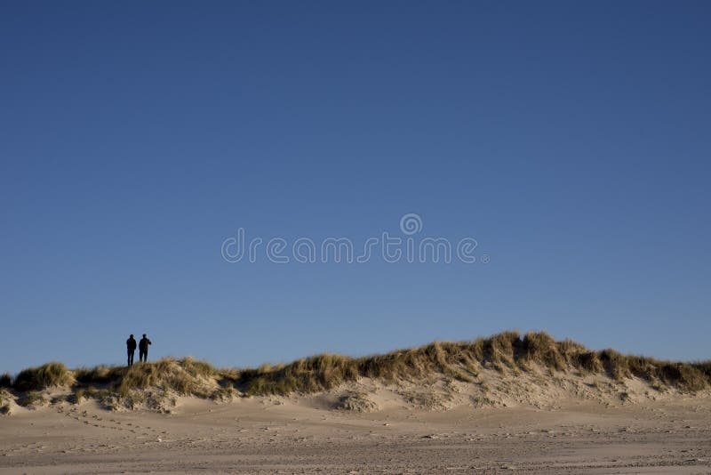 Two people on Danish dunes