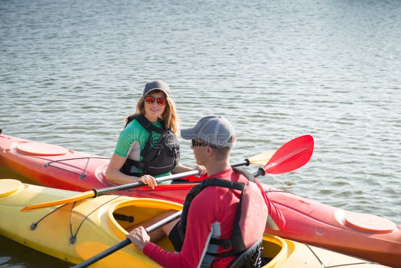 Two People in Kayaks on the River Stock Image Image of boating