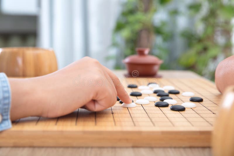 Tradicional Jogo Chinês Para Duas Pessoas Vão Foto de Stock - Imagem de  placa, povos: 225714768