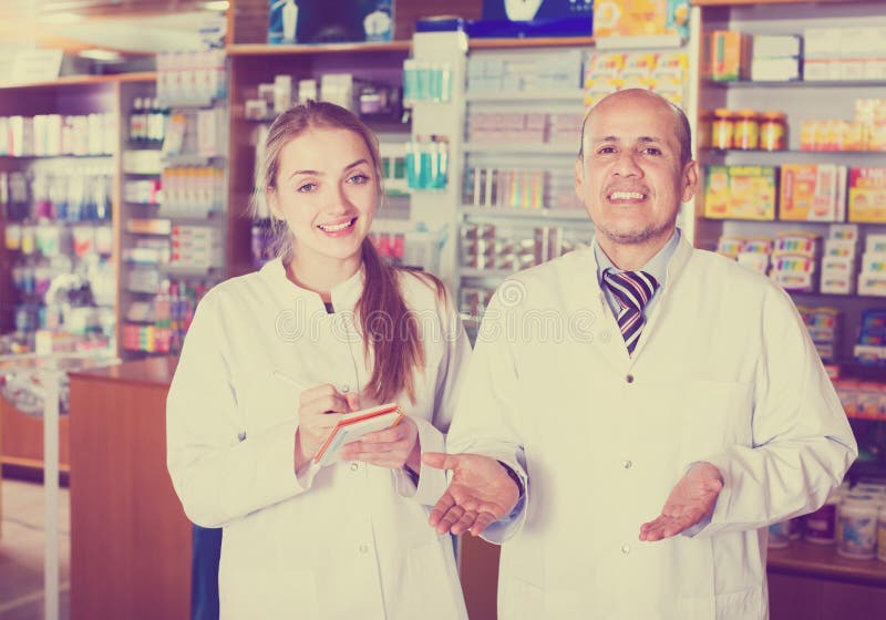 Team of pharmaceutist and technician working in pharmacy. Team of pharmaceutist and technician working in pharmacy