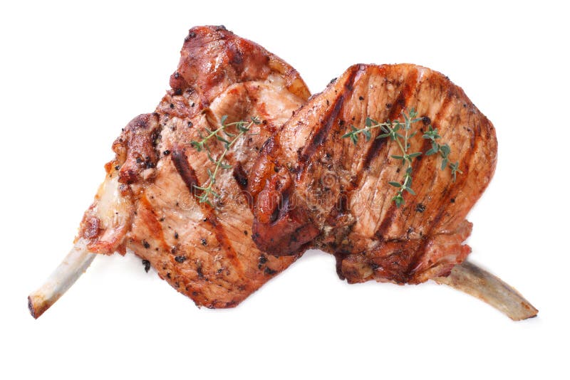 Two pieces of of grilled pork isolated on white close up