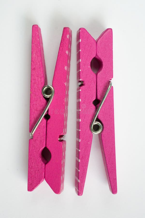 Two Pink Clothes Pins with Fun Patterns Flipped Top View Stock Photo