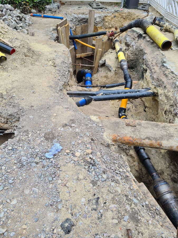 Two Plastic Pipes in a Sand Ditch Stock Image Image of repair