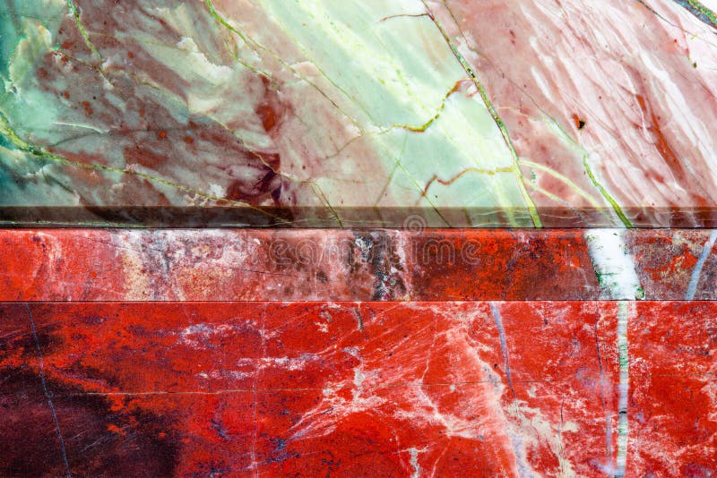 Two polished red Jasper tiles. Decorative stone background macro view. Multi color natural mineral surface with a unique. Pattern and texture royalty free stock images Two polished red Jasper tiles. Decorative stone background macro view. Multi color natural mineral surface with a unique. Pattern and texture royalty free stock images