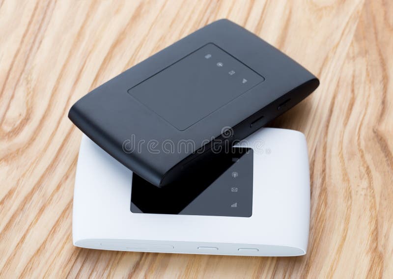 Two portable routers on the table. royalty free stock photography