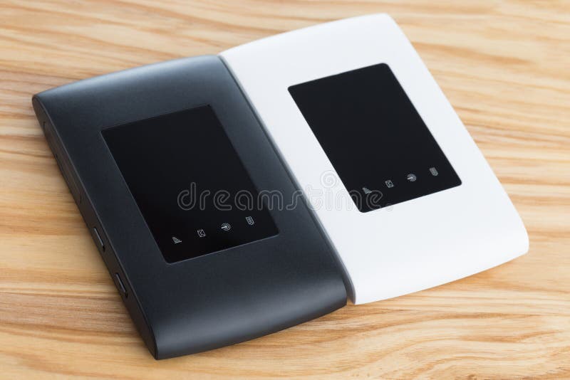 Two portable routers on the table. royalty free stock photography