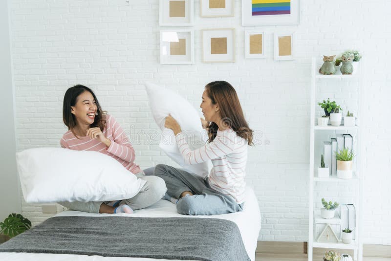 Two Pretty Best Friends Forever Girlfriend Talk Hug And Laugh Together On Bed At Cozy Home