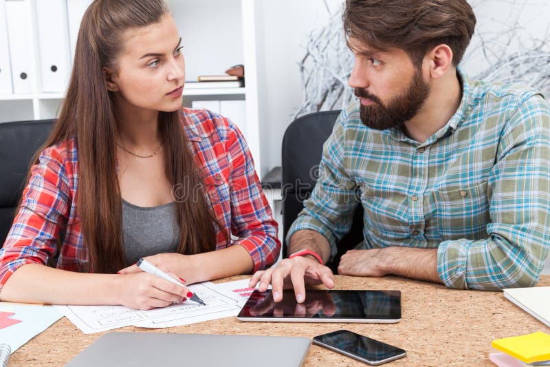 Two pretty colleagues working together royalty free stock image Two pretty colleagues working together royalty free stock image