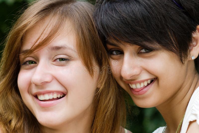 Two pretty girls laughing