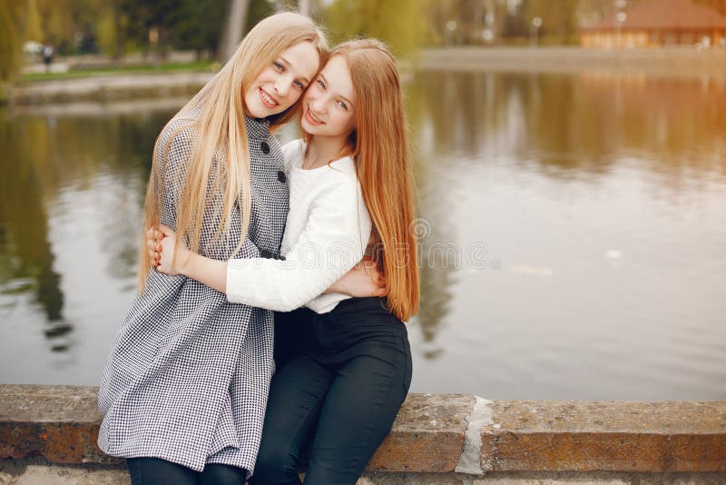 Two Pretty Sisters In A Park Stock Image Image Of Person People