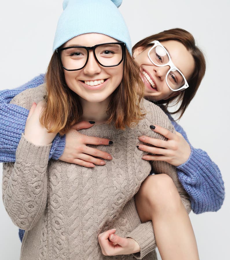 Two Pretty Teen Girlfriends Smiling Hugs and Having Fun Stock Photo ... photo