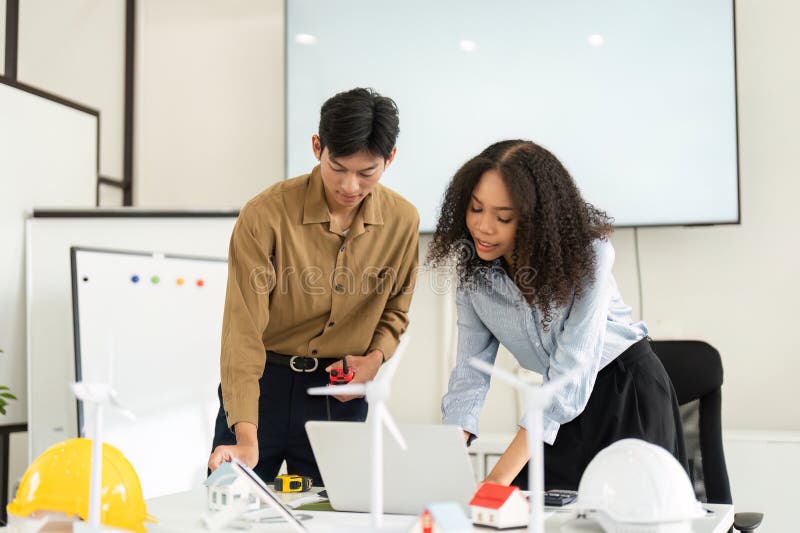 Collaboration in Renewable Solutions. a Focused Team Working on ...