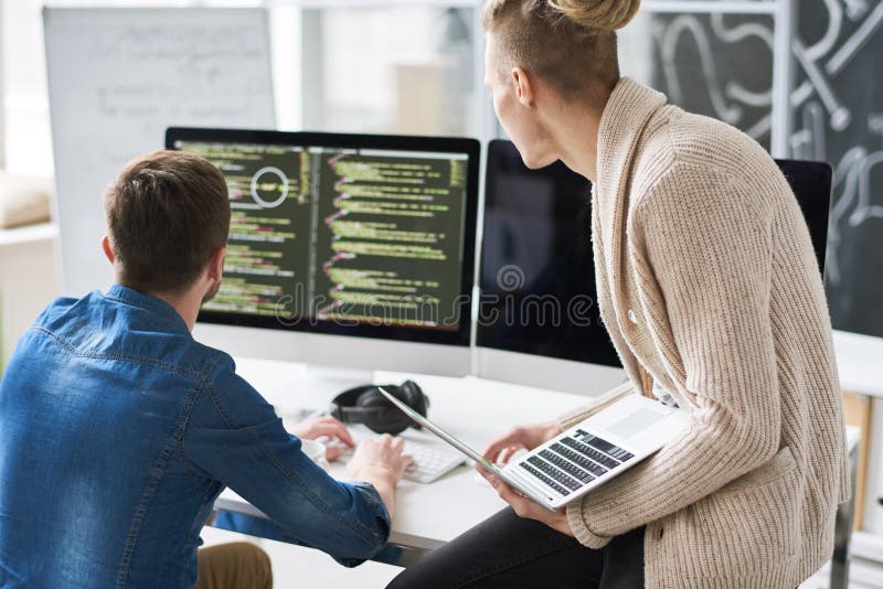 Two Program Developers Collaborating on Project Stock Photo - Image of ...