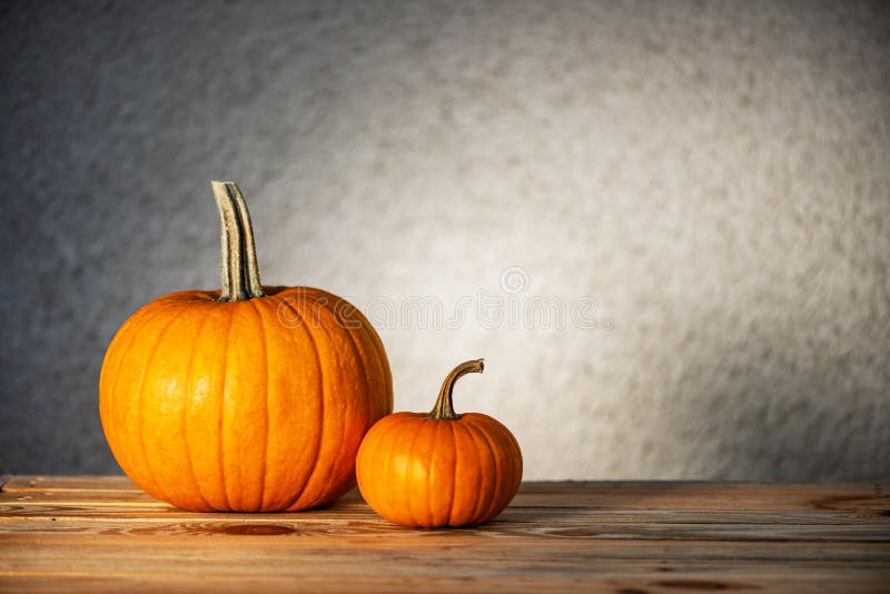 Pumpkins on wooden table stock photo. Image of background - 45226084