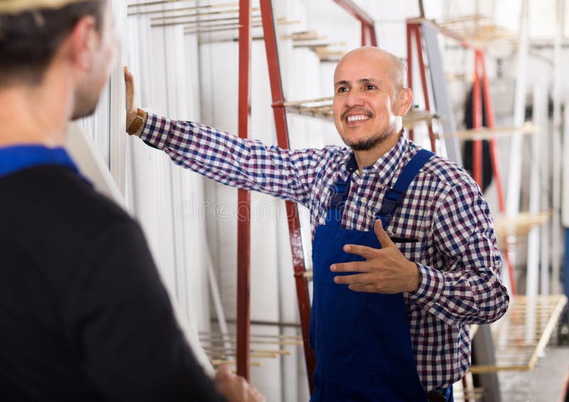 Two PVC Industry Workers in Coveralls Stock Photo Image of aluminium