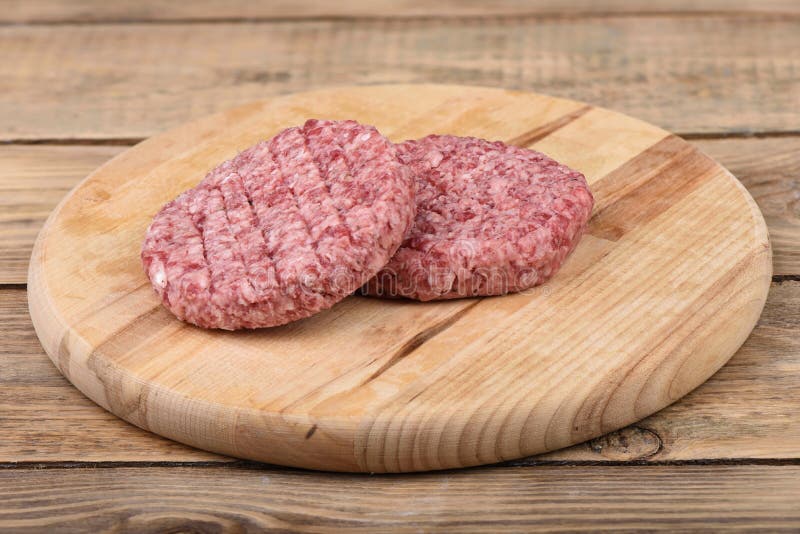 Raw Pink Beef Burgers on Grill Stock Photo Image of beef, grill 107063892