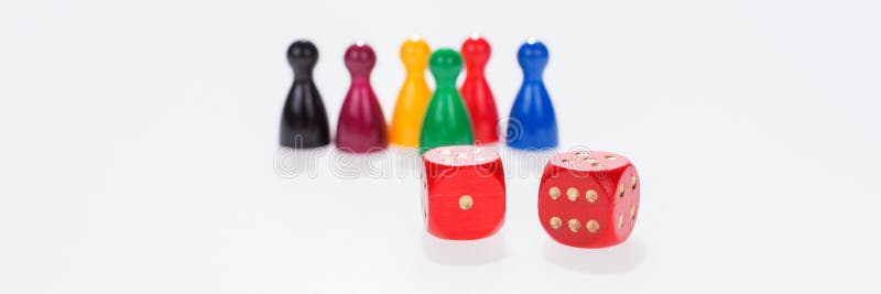 Two red dice with board game figures