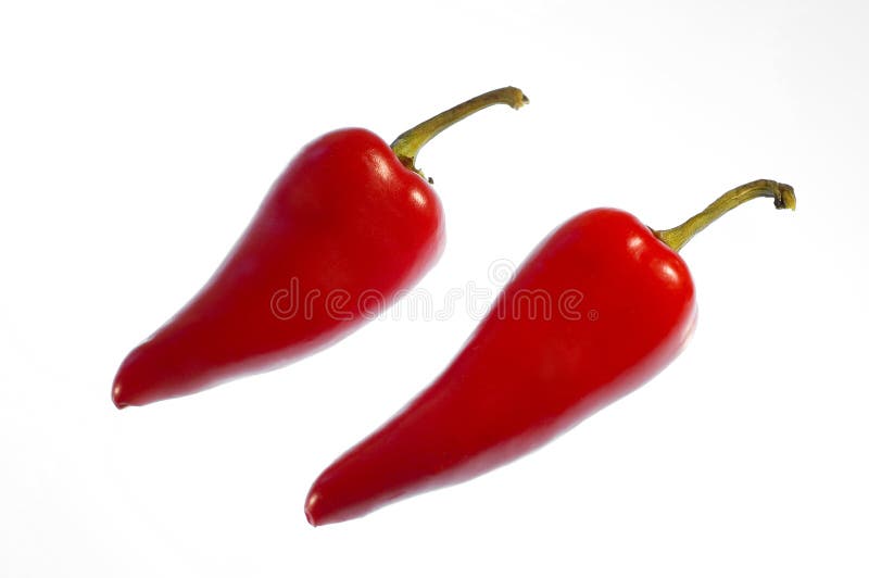 Two red hot chili peppers stock photos Two red hot chili peppers stock photos
