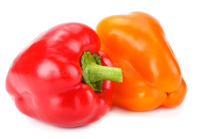 Two red and yellow sweet bell peppers isolated on white background stock images Two red and yellow sweet bell peppers isolated on white background stock images