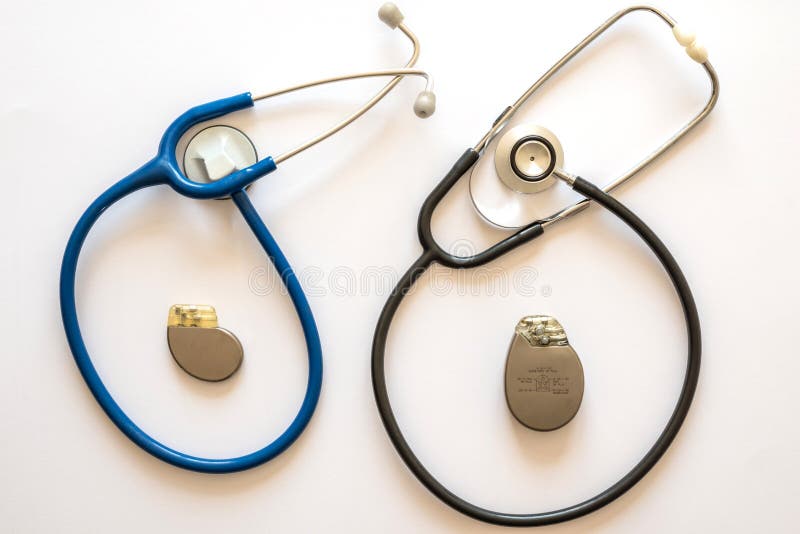Two Rounded Stethoscopes with a Pacemaker Battery in the Center with