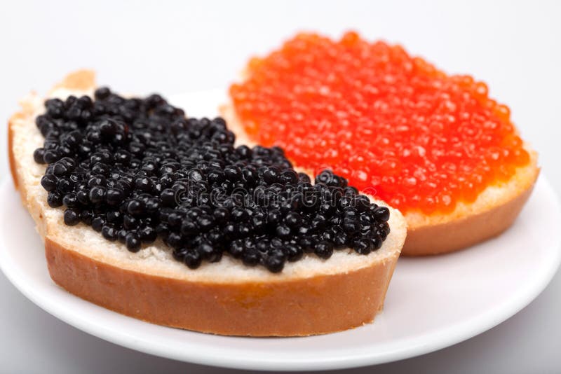 Two sandwichs with red and black caviar