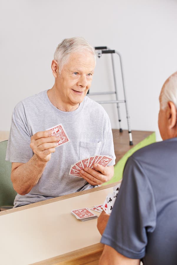 Two Senior People Playing Cards Stock Image Image of citizens