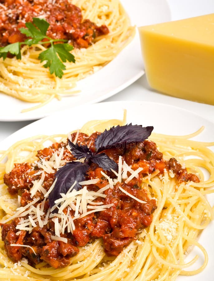 Two servings of spaghetti bolognese