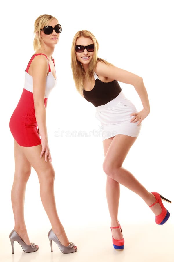Two crazy women in summer clothes sunglasses. royalty free stock photo Two crazy women in summer clothes sunglasses. royalty free stock photo