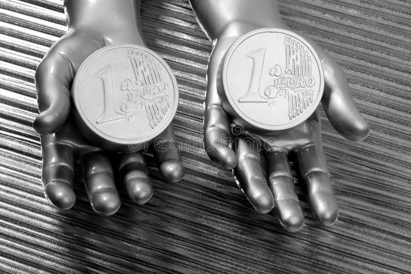 Two silver euro coins in futuristic robot hands