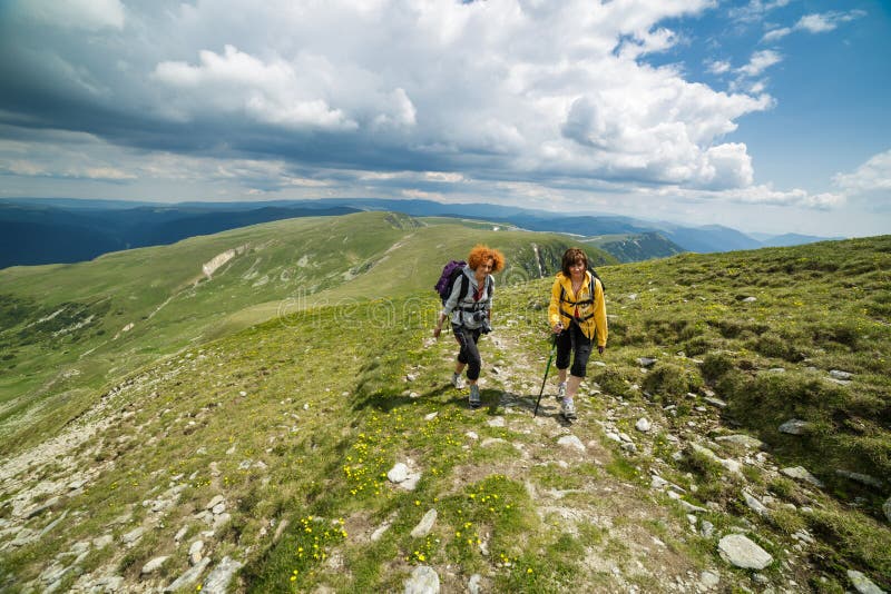 Two Sister Hiking into the Mountains Stock Photo - Image of endurance ...