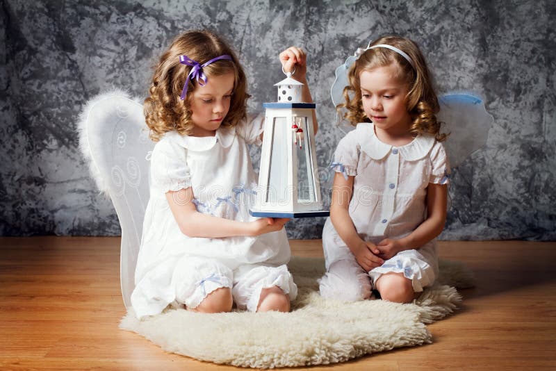 Two Sisters with Angel Wings Stock Photo - Image of female, childhood ...