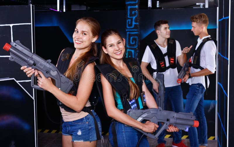 An Image Of A Young Boy Girl Team Playing Laser Tag Game Isolated